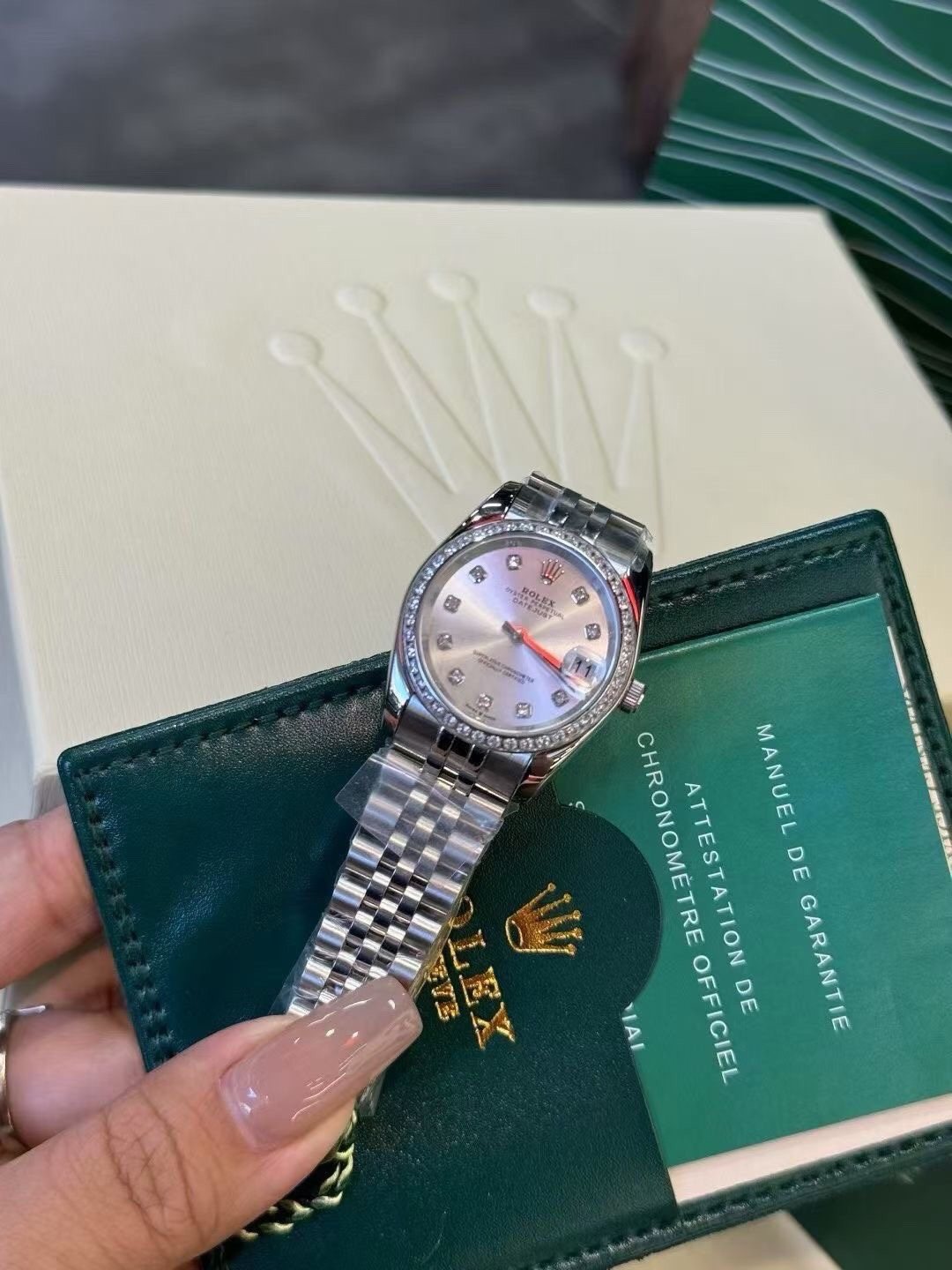 Rolex Pale Iridescent Dial Metal Bracelet Watch — model