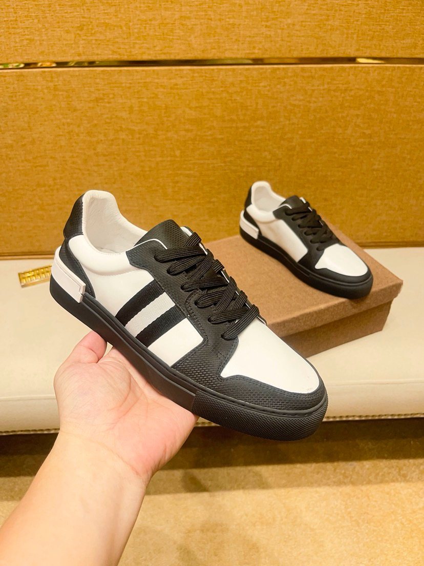 Black and White Stripe Low-Top Sneakers — model
