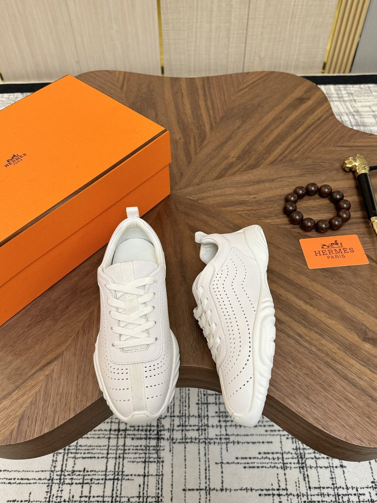 Hermès Perforated Low-Top Sneakers — front