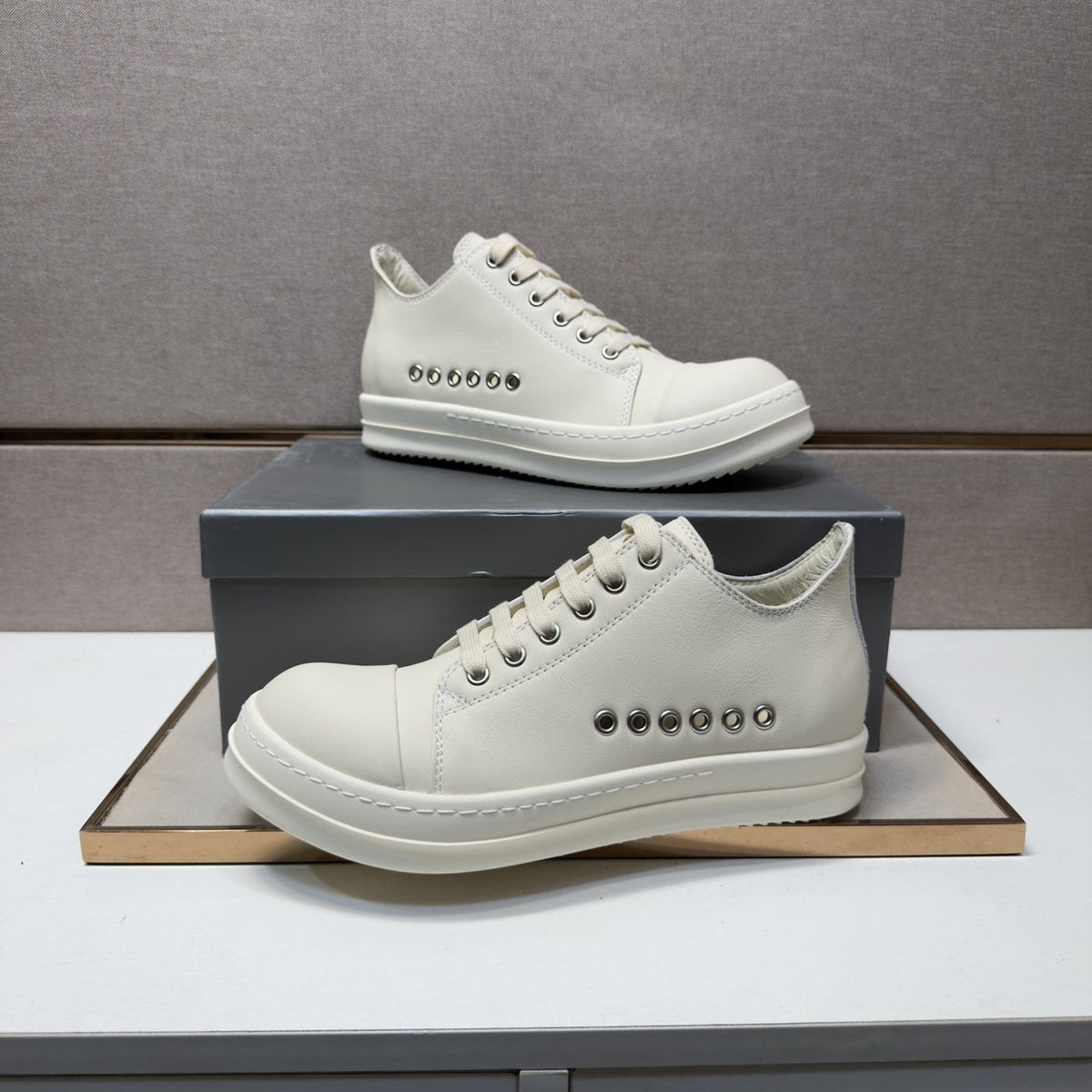Black and Off-White Low-Top Sneakers — model
